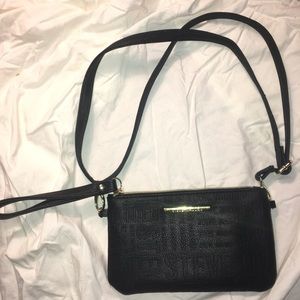 Wristlet with detachable strap & portable charger